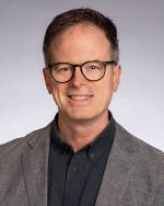 headshot of Will Monroe