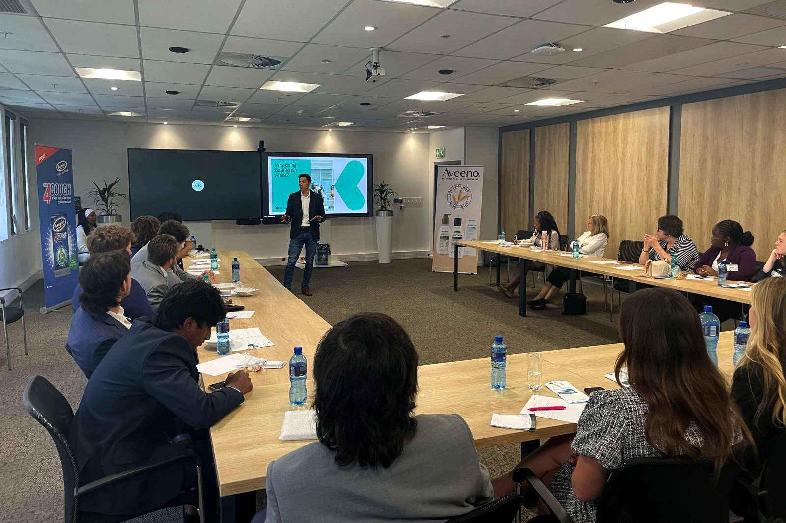 students at business meeting