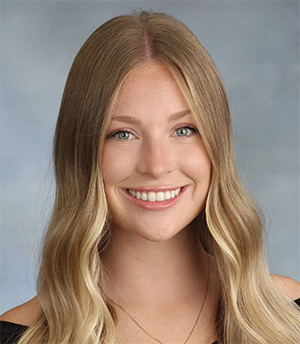 Anna Fuselier headshot in a black dress