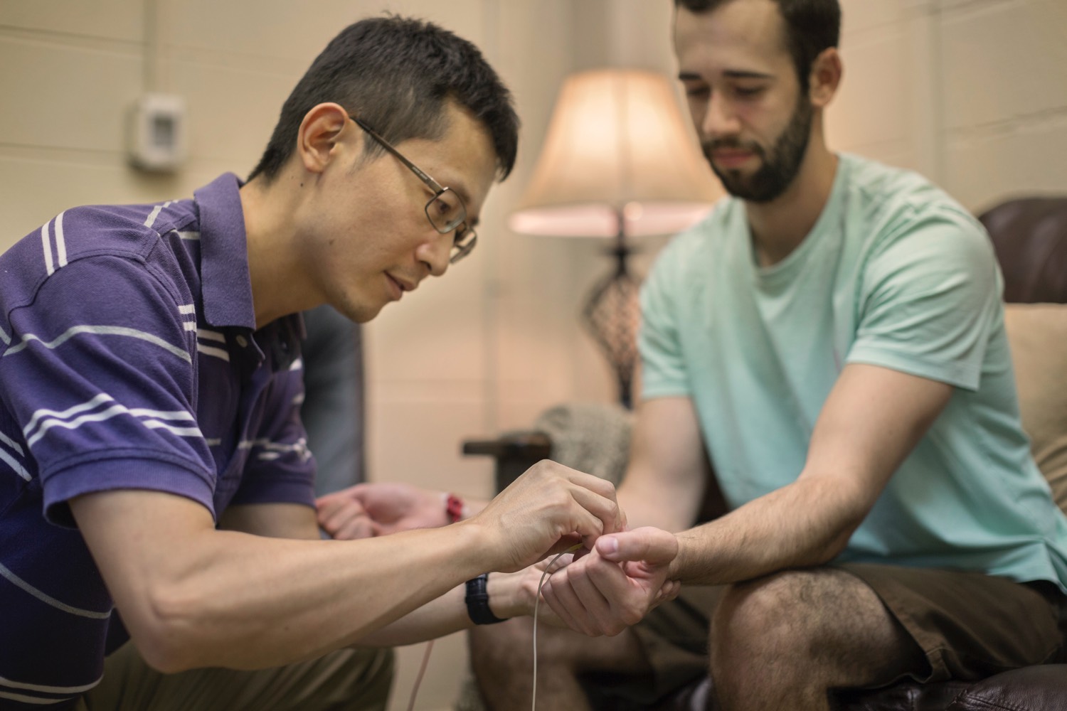 Professor preparing student for experience